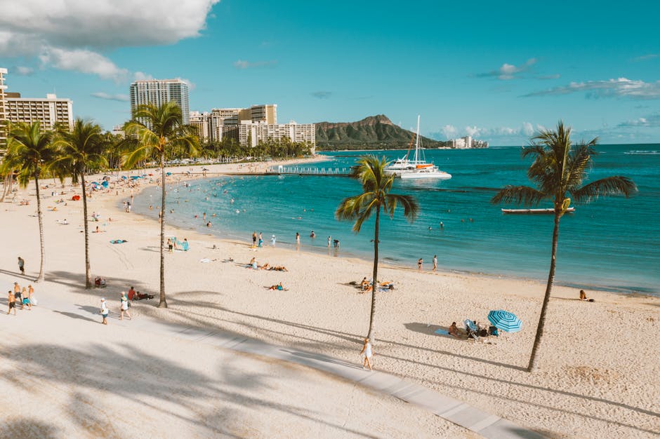 pexels-photo-4783884-4783884 Sunny day at Waikiki Beach with a view of Diamond Head and people enjoying the ocean.